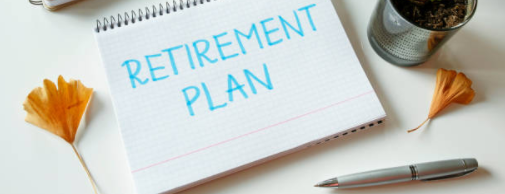 retirement-plan-written-in-notebook-on-table-s-962311818