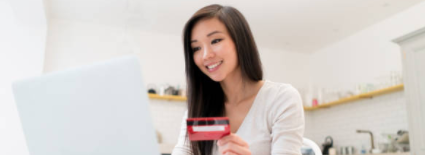 woman-with-credit-card-at-computer-s